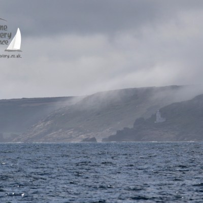 mist creeping up the coast