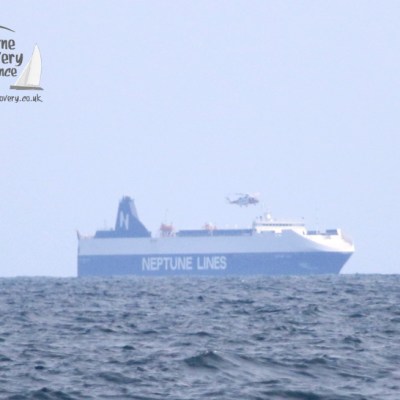 cargo ship and helicopter