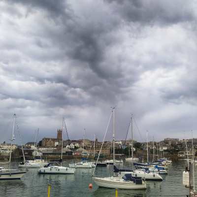 Penzance harbour under stormy sky